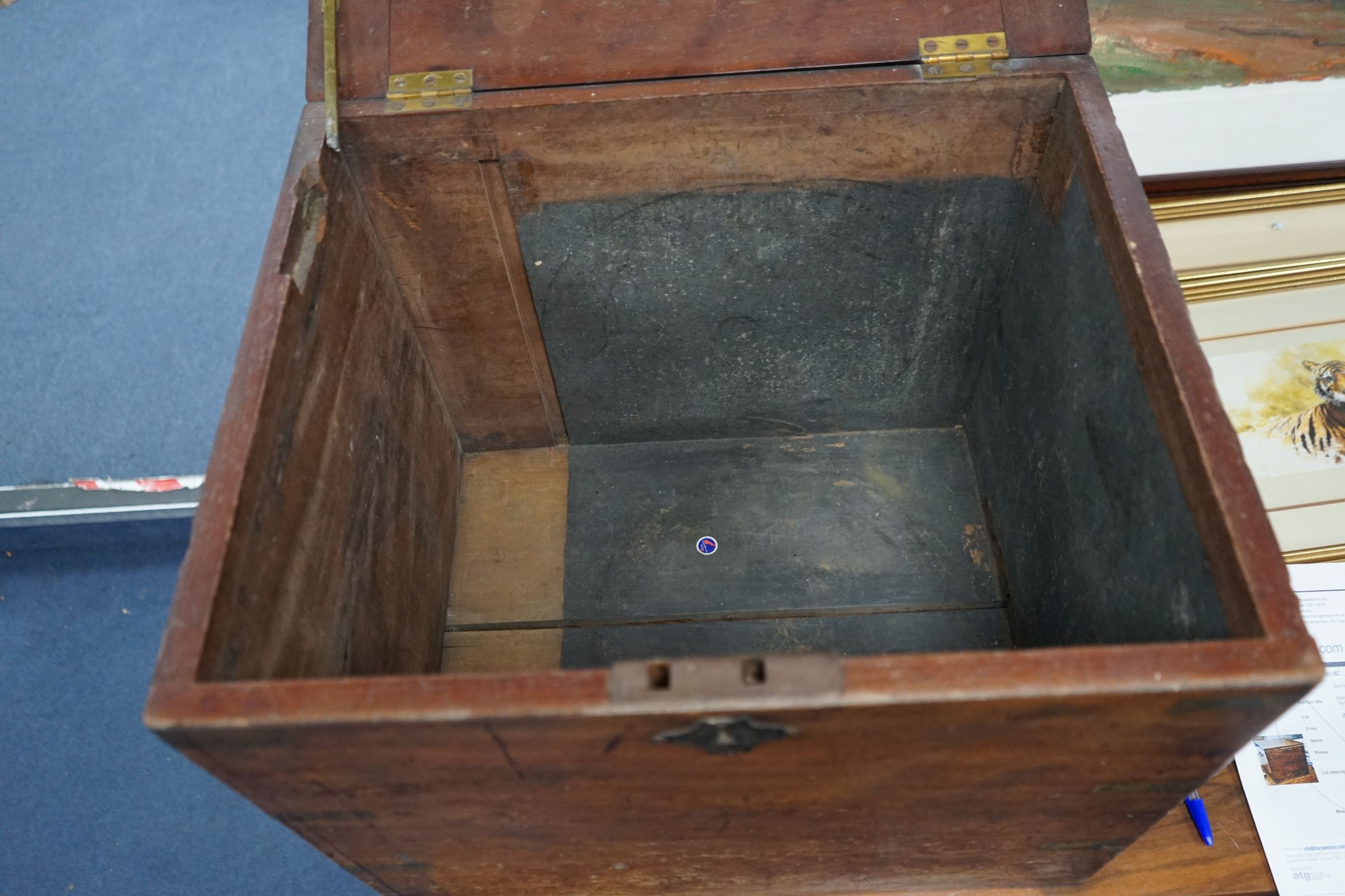 A 19th century brass-bound teak campaign trunk, having hinged top and side mounted carrying handles, width 55cm, depth 43cm, height 44cm